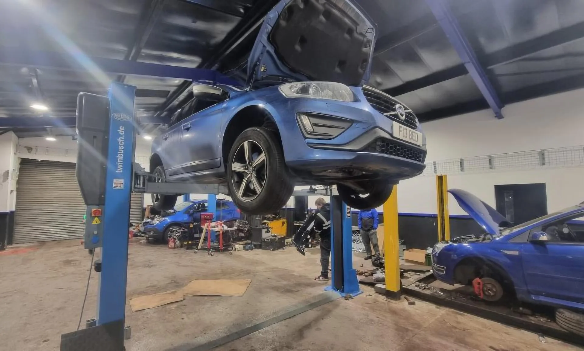 A car raised on a lift being worked on at MechTronic in Kilmarnock